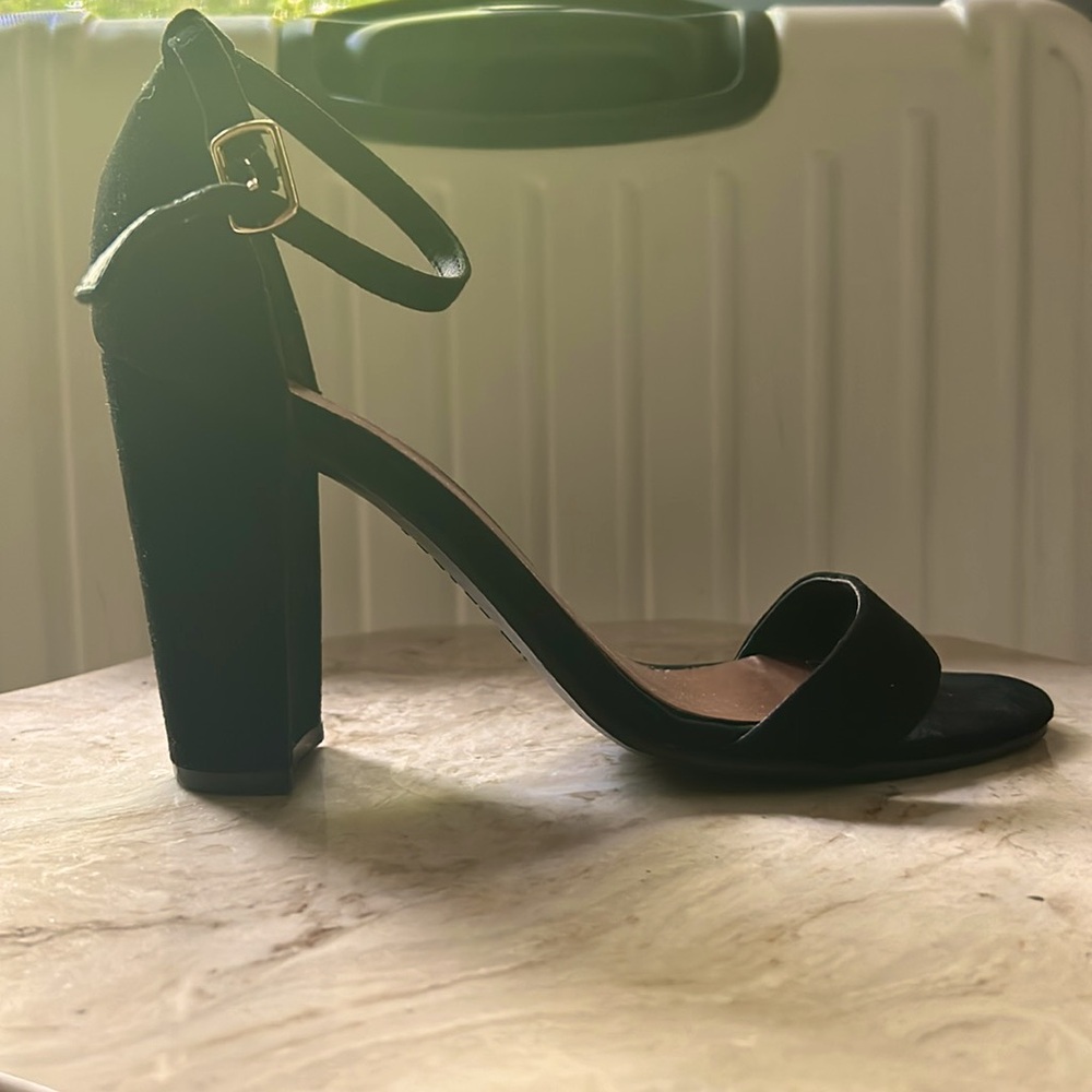 Size 7.5 Indigo rd.  black suede heels. Minimal signs of wear.